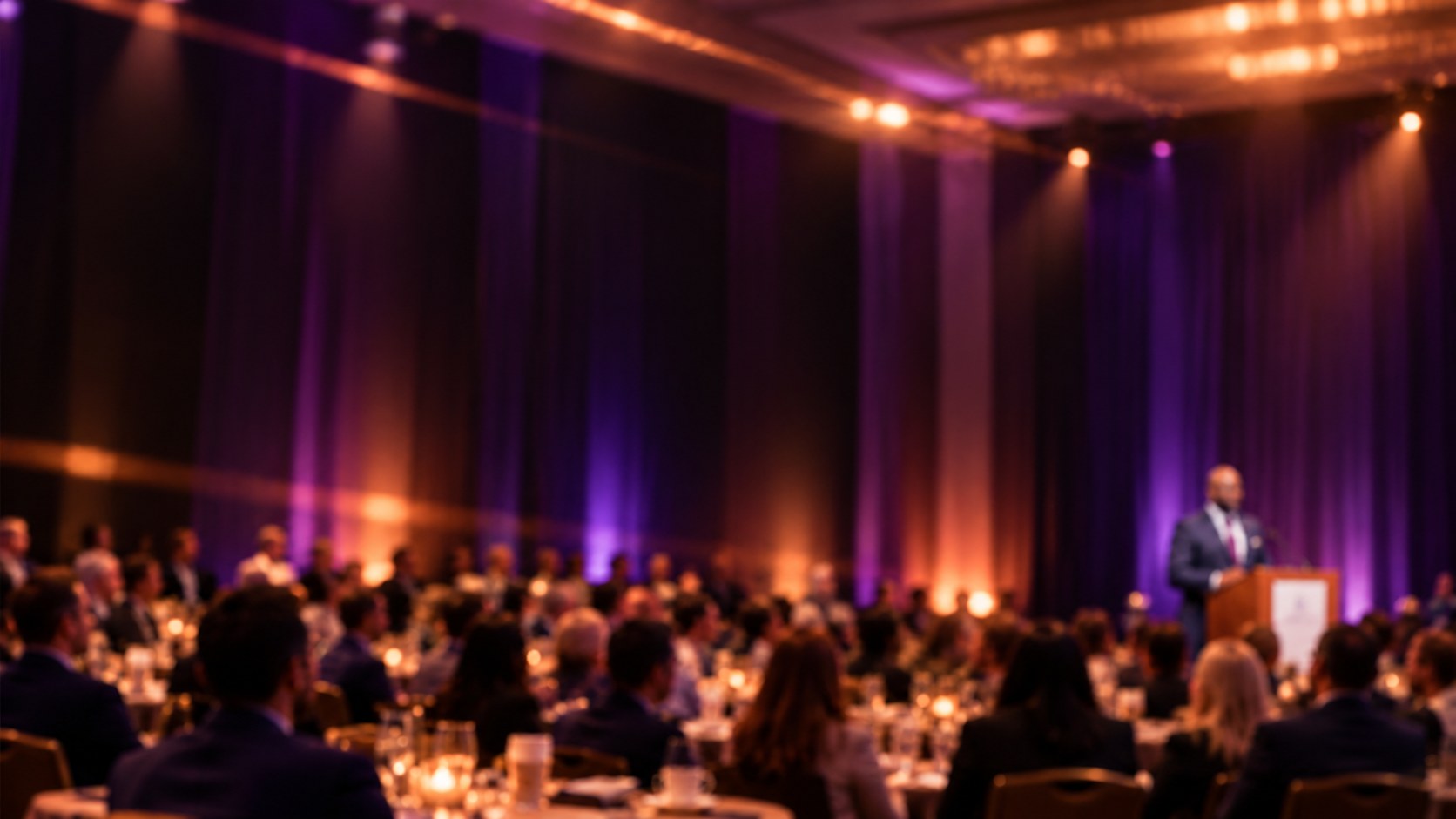 Oscar L. Frazier speaking at a ballroom event